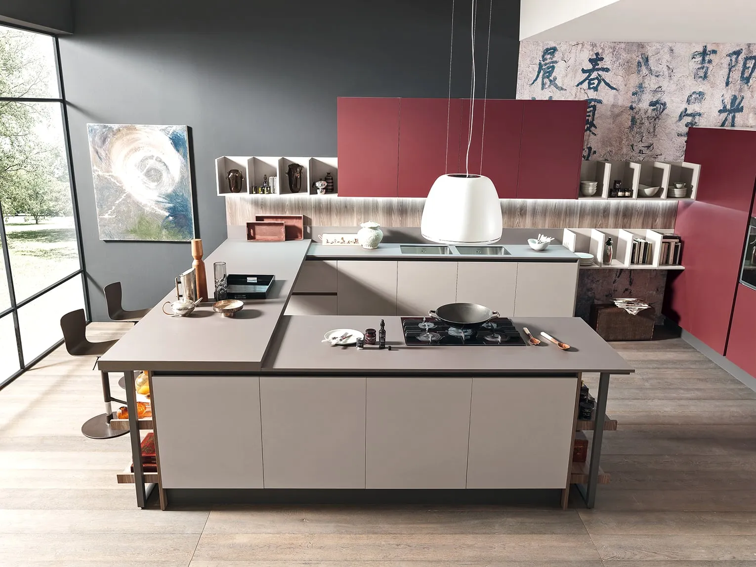 Cucina componibile moderna con isola color tortora e piano cottura a filo